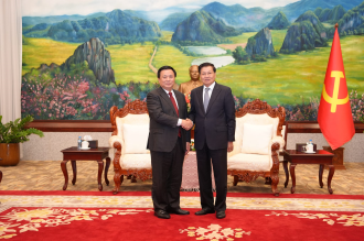 President Thongloun Hosts Visiting Vietnamese Delegation